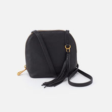 Load image into Gallery viewer, A HOBO Icon, our Nash crossbody purse is ever-cool with its fringe tassel and compact size, perfect for travelers, urban nomads, festival goers and minimalists. Crafted in our signature velvet hide, our softest and most casual leather that only gets more beautiful over time.
